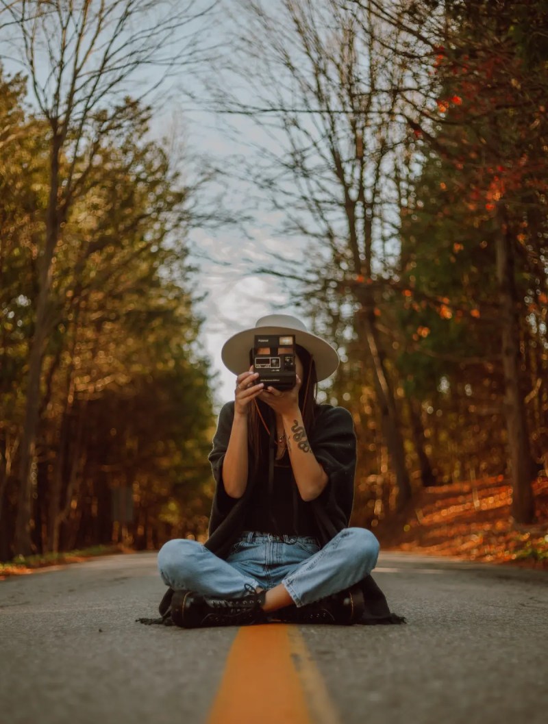 female photographer with camera